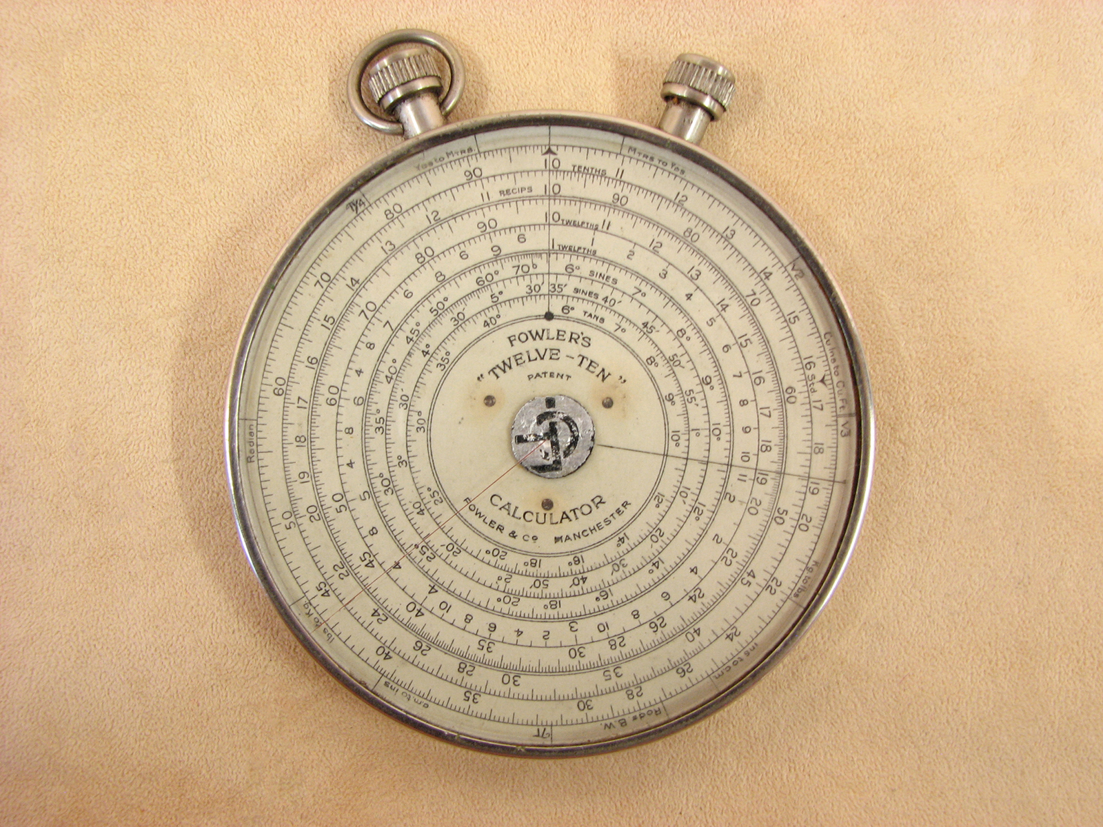 Fowlers Twelve Ten architects circular slide rule and calculator